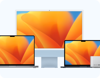 computer and laptop screens with an orange background
